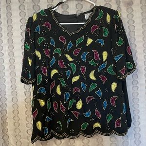 Beautiful beaded shirt, a lot of pretty detail!